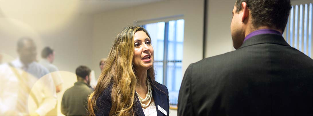 Woman in Human Resources chatting with a man